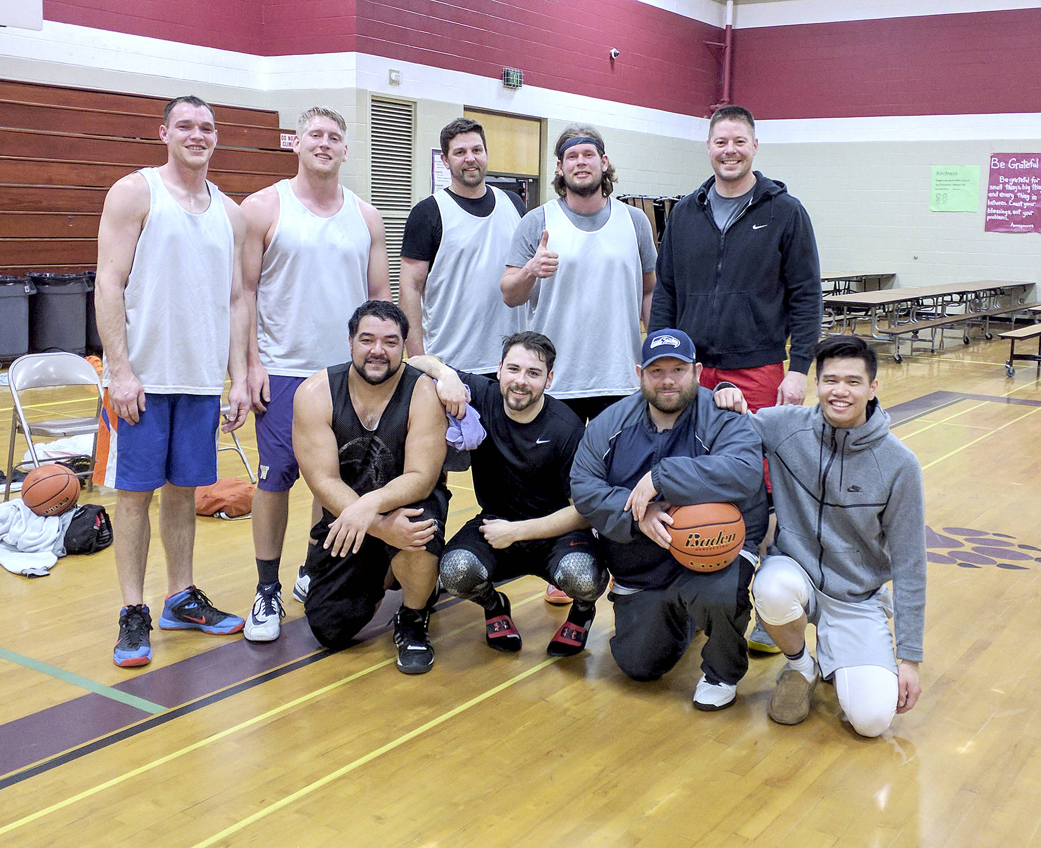 Frank Edward Jones is the winner of the Silver Division championship in the Port Angeles City Basketball League, beating Carlsborg Shell 69-64.