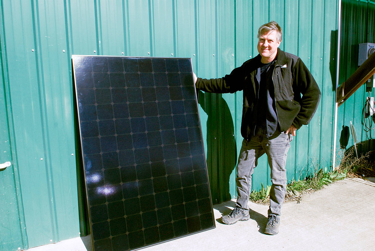 Andy Cochrane, president of Power Trip Energy Corp. in Port Townsend, will be an exhibitor and presenter at the 2018 Port Townsend Home Show on Saturday. The company will feature a new, American-made, high-efficiency solar panel from Sun Power that provides more power per square foot than previous models. (Jeannie McMacken/Peninsula Daily News)