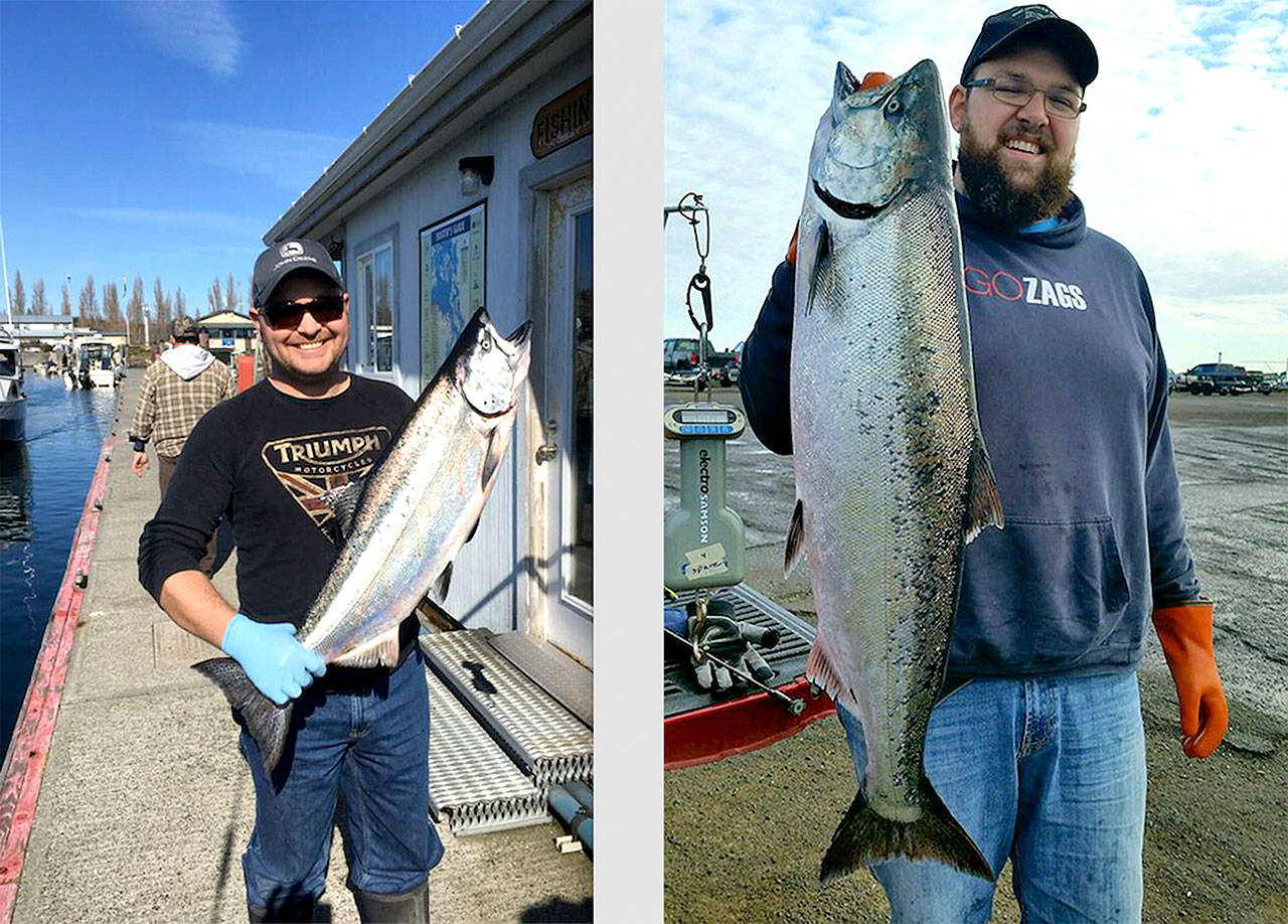 Mount Vernons Micah Hanley, left and Port Angeles Kyle Madison each caught 16.85-pound chinooks in the Olympic Peninsula Salmon Derby. Because Hanley caught his salmon first, on Saturday, he was awarded first place and a $10,000 prize, which he split with a friend. Madison won $2,000 for his fish. More than 850 tickets were sold for the event, which generally saw good weather.