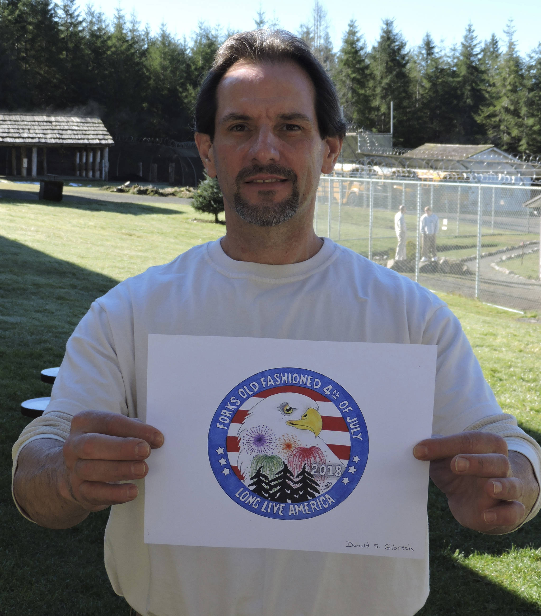 Donald Gilbrech is seen here at Olympic Corrections Center with his winnng design.