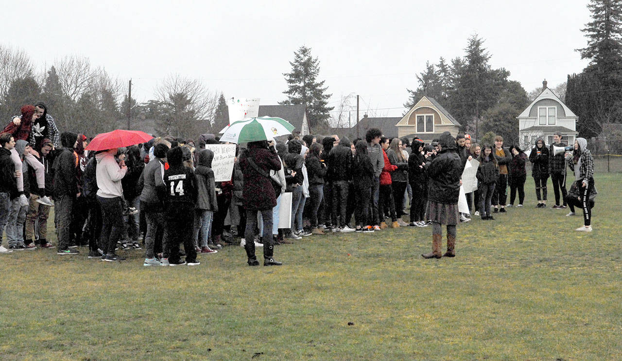 More than 300 members of the Port Townsend High School student body stood in the rain to participate in Wednesdays demonstration to denounce gun violence on school campus. (Jeannie McMacken/Peninsula Daily News)