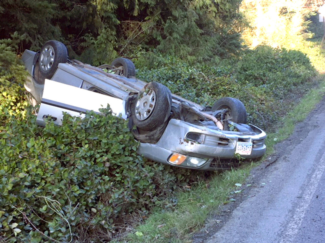 A Subaru flipped onto its top after the driver swerved to miss a deer in the road on state Highway 112. The driver was reported as not injured. (Clallam County Fire District No. 2)