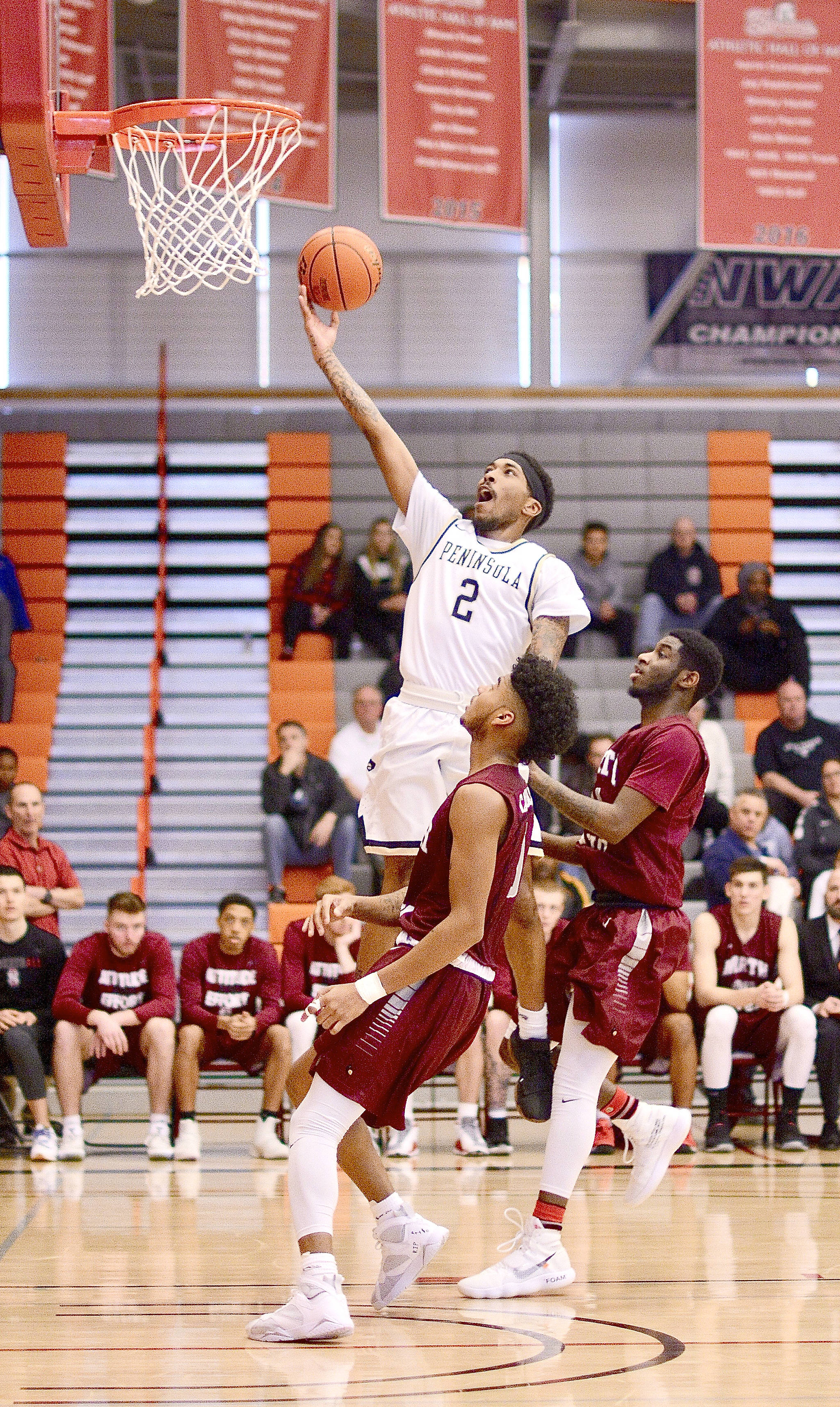 &lt;strong&gt;Jay Cline/&lt;/strong&gt;for Peninsula Daily News                                Peninsula College’s Cameron Burton goes up for a layup against North Idaho in the NWAC Championship game Sunday in Everett.