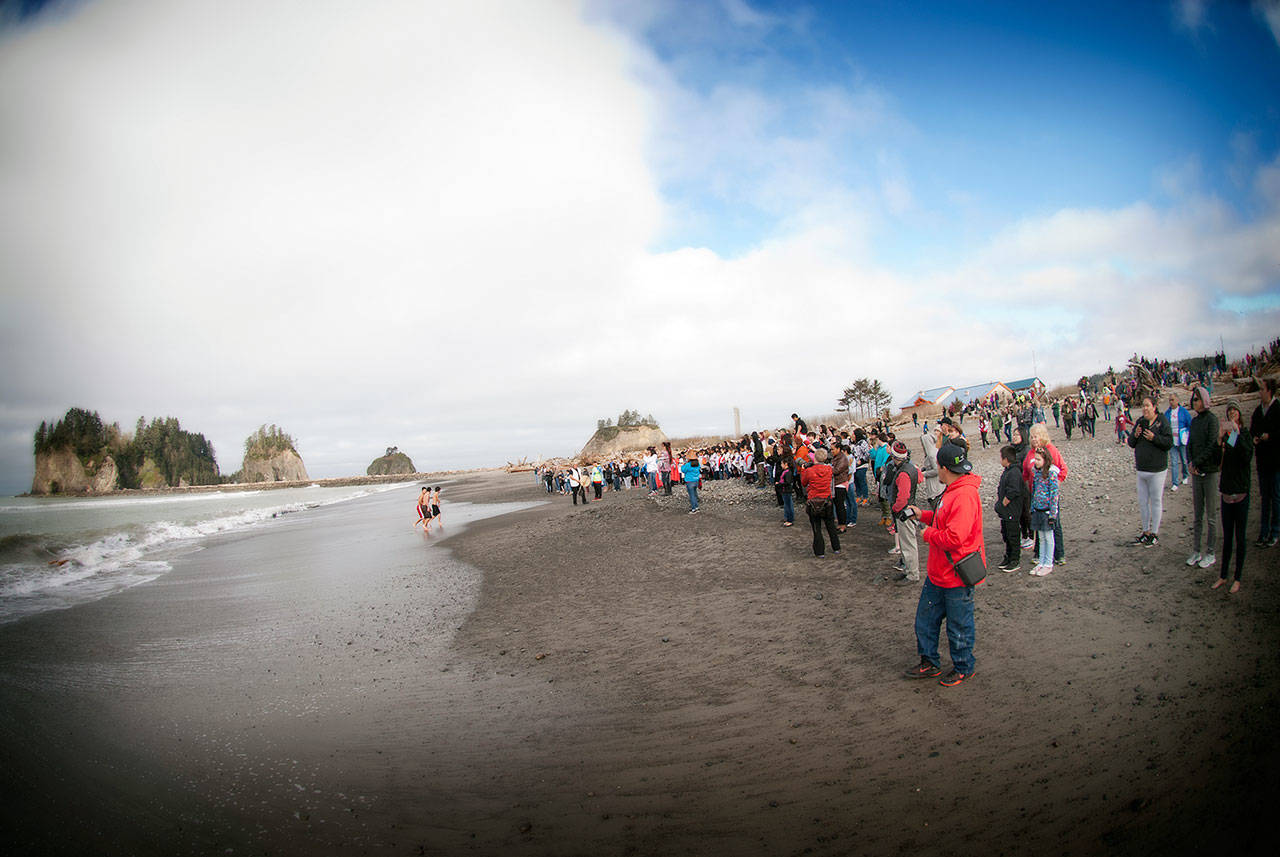 Community members welcome the annual migration of the gray whales in a recent ceremony. (Cheryl Barth)