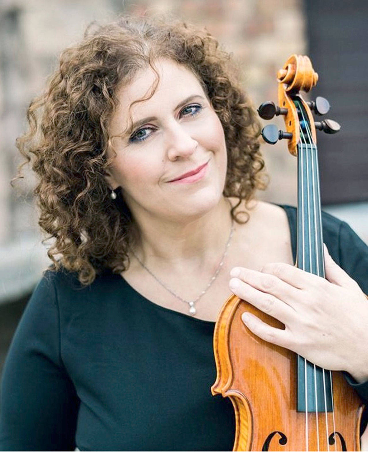 Violist Cheryl Landry Swoboda returns to her hometown of Port Angeles for a concert of Brahms, Bartok and Berlioz this Saturday.