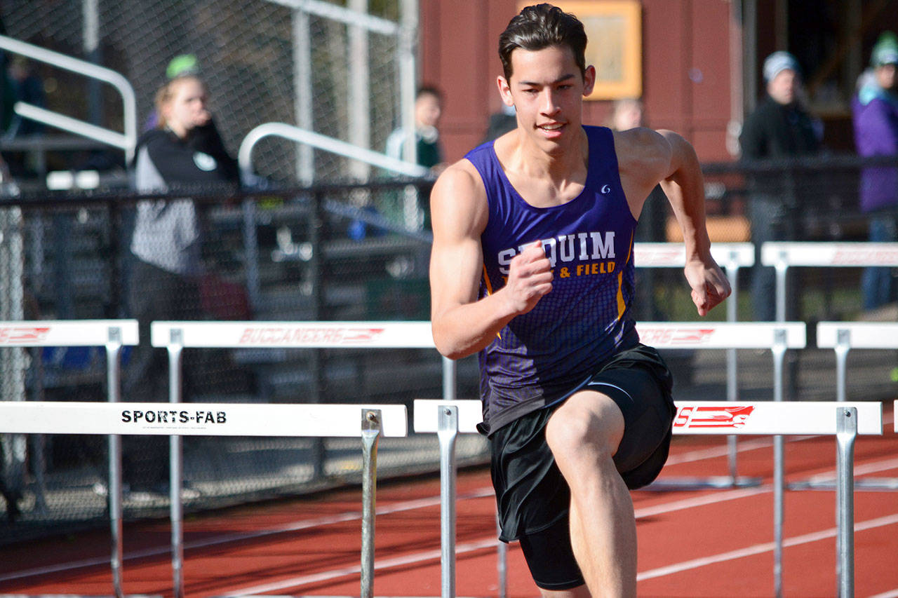 Sequim’s Riley Martin competes in the 110-meter high hurdles Thursday at Kingston. Martin won the event with a time of 16.94 and he also won the 300-meter hurdles. Kitsap News Group/Mark Krulish