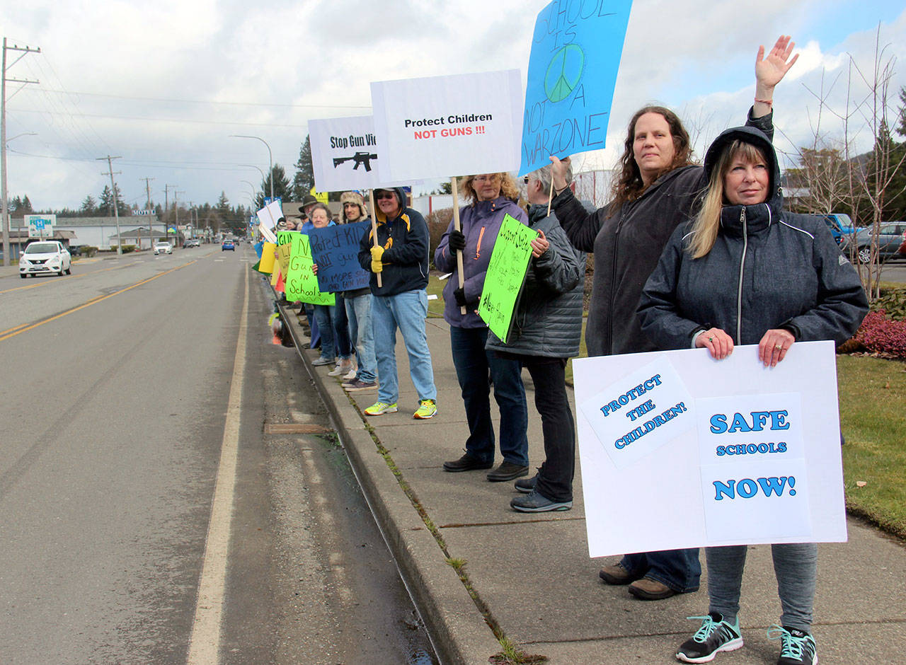 Folks for Change held a rally in support of Saturday’s nationwide March for Our Lives in Forks. About 40 West End residents gathered at the Forks Transit Center to advocate for school safety and gun laws. (Christi Baron/Olympic Peninsula News Group)
