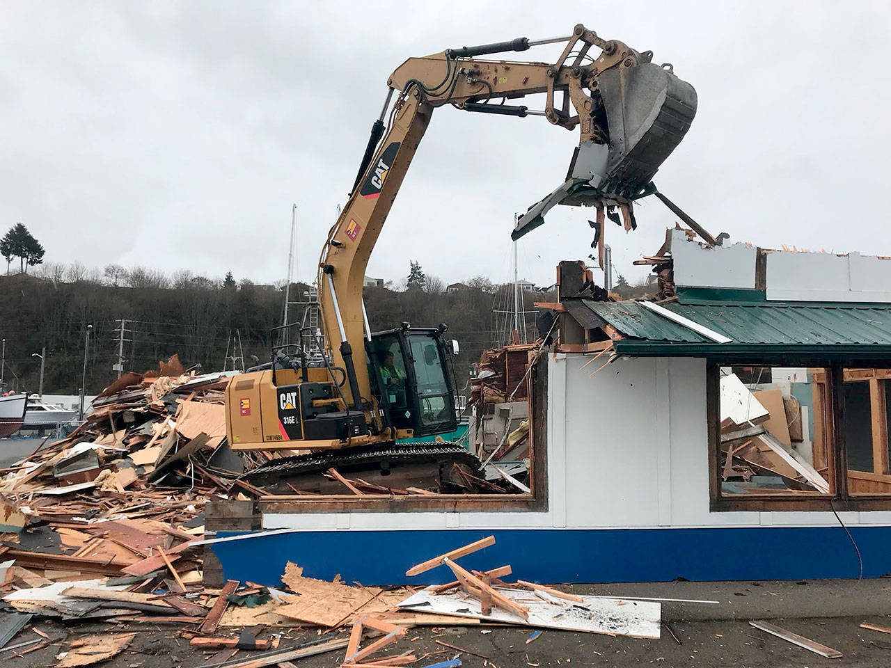 The site of the former Jig & Lure Fish Co. restaurant at the Port Angeles Boat Haven was demolished Monday to make way for a laundromat and boat-storage spaces. (Paul Gottlieb/Peninsula Daily News)