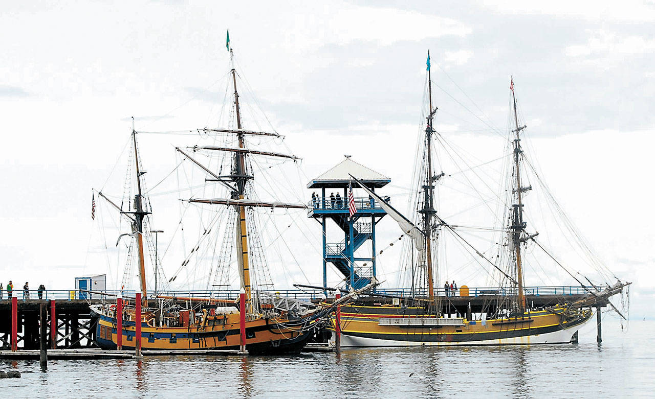 The tall ships Hawaiian Chieftain, left, and Lady Washington, both home ported in Grays Harbor, sit moored at Port Angeles City Pier in May 2011. (Keith Thorpe/Peninsula Daily News)