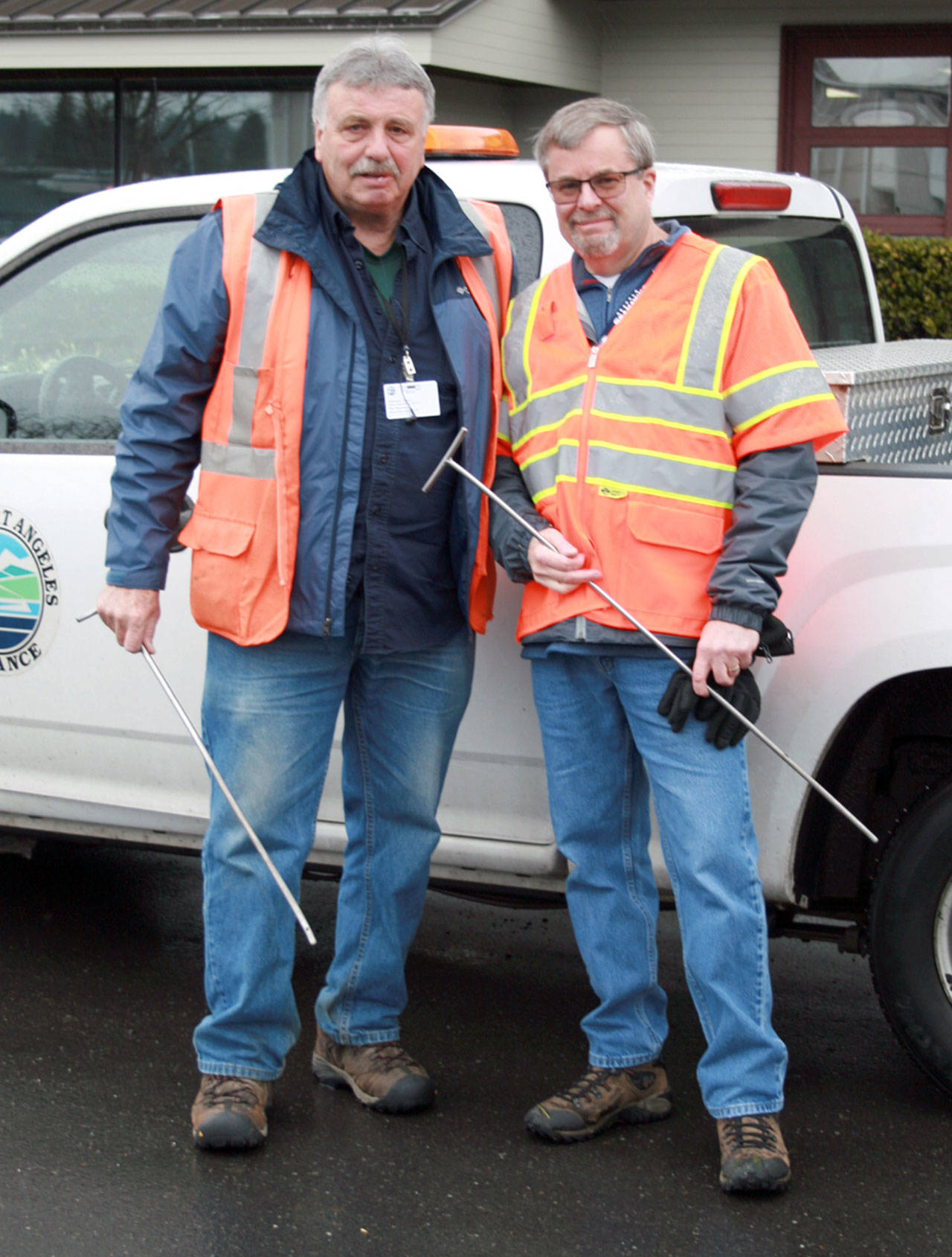 City Manger Dan McKeen, right, joins meter reader Steve Dryke on his route before he retired.