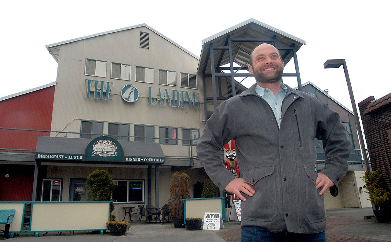 Erik Marks, the new owner of The Landing mall, stands in front of his building near the Port Angeles waterfront. (Keith Thorpe/Peninsula Daily News)