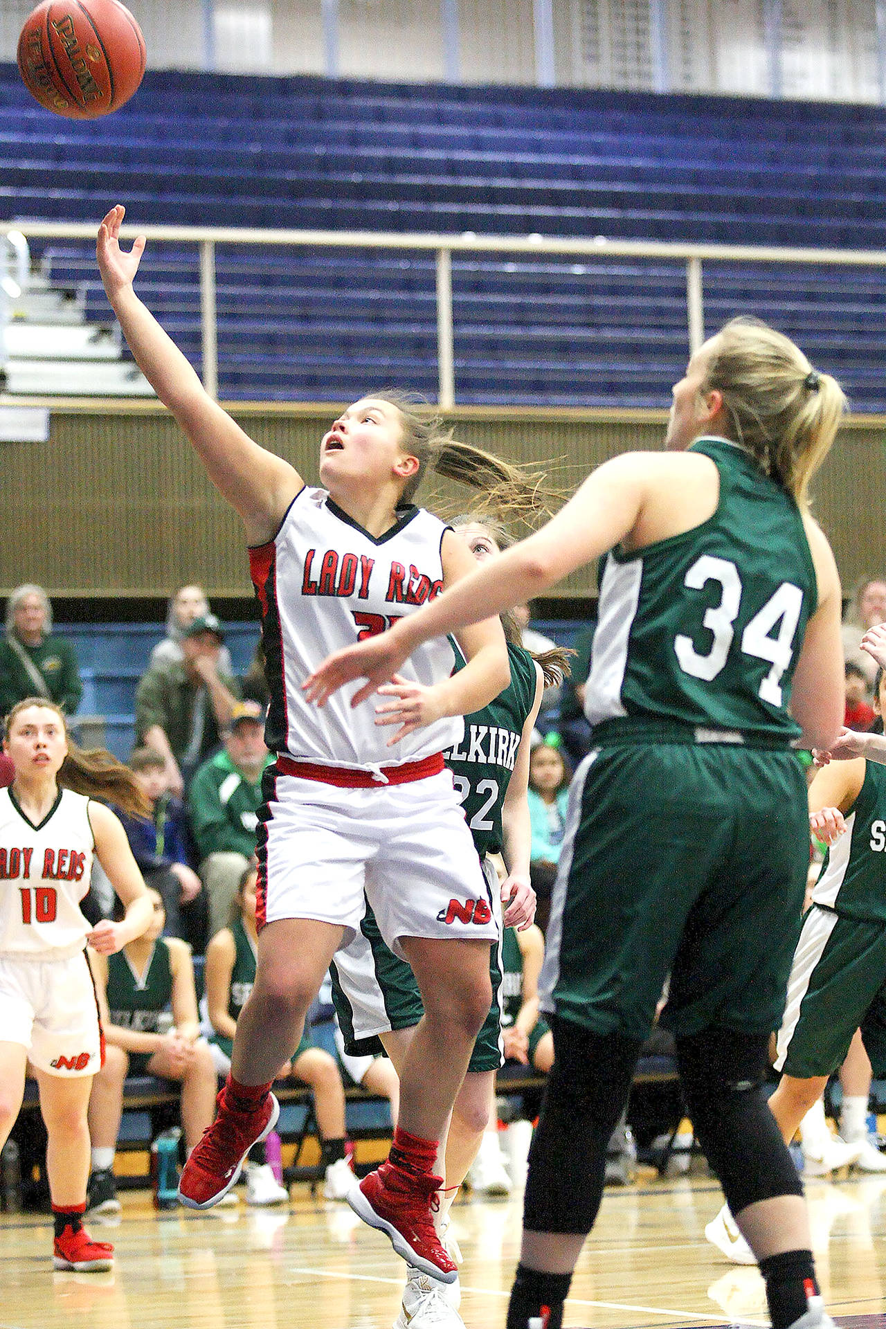 David Willoughby/for Peninsula Daily News Neah Bay senior Gina McCaulley, left, earned Associated Press honorable mention All-State honors. She is a member of the Peninsula Daily News All-Peninsula Girls Basketball team.