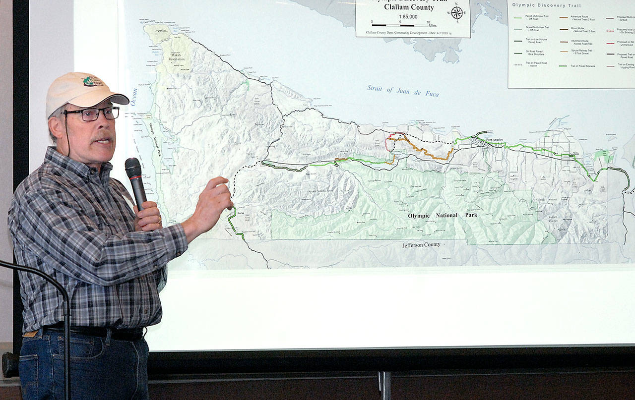 Jeff Bohman, president of the Peninsula Trails Coalition, describes progress on connecting segments of the Olympic Discovery Trail during Wednesday’s Port Angeles Regional Chamber of Commerce luncheon. (Keith Thorpe/Peninsula Daily News)