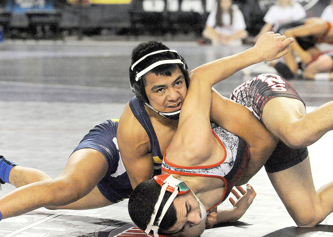 Forks’ Josue Lucas won his second straight state wrestling championship at the Mat Classic in February. Lucas is coming back next year to try for a third straight title. (Lonnie Archibald/for Peninsula Daily News)