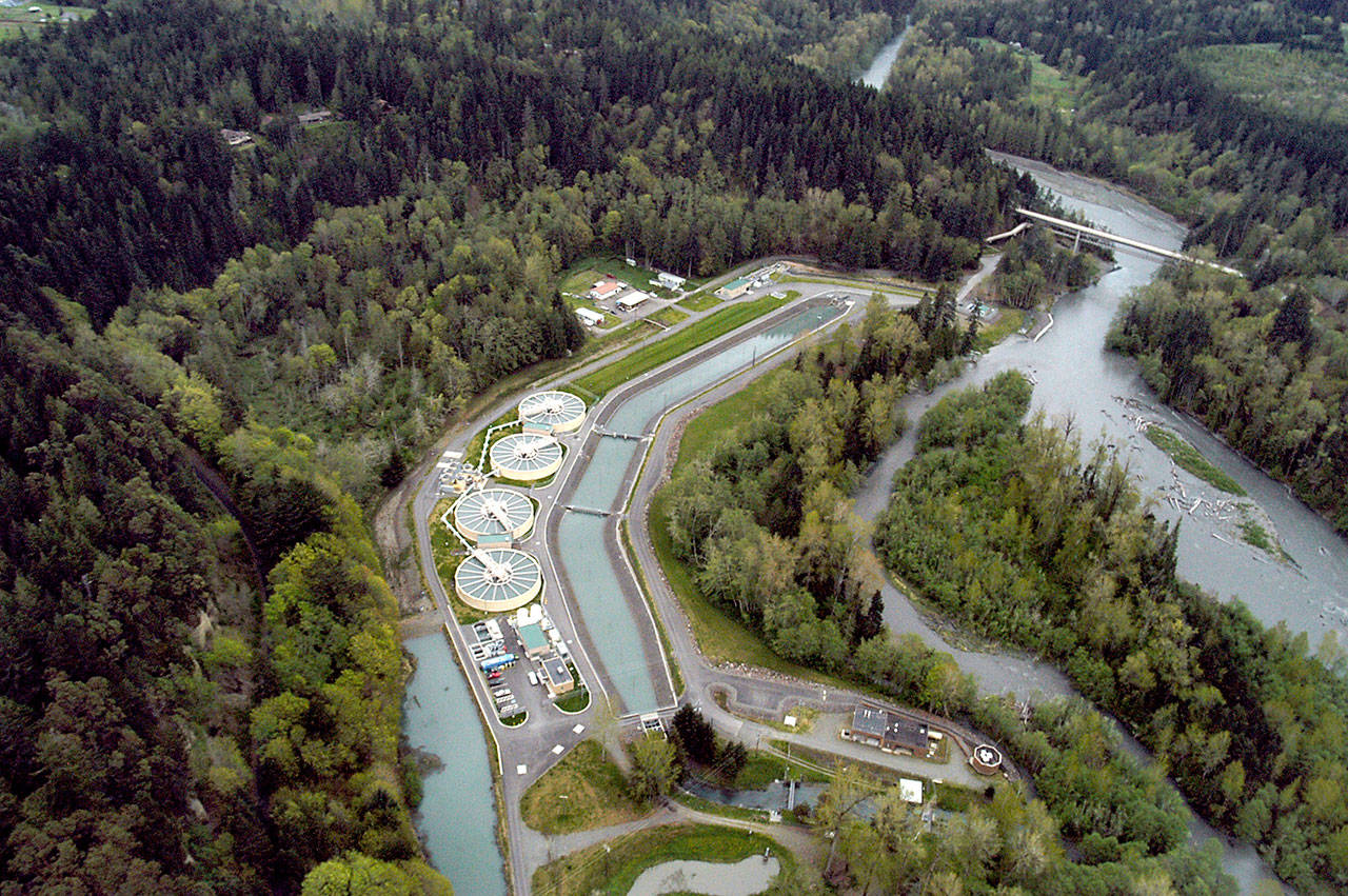 The water facilities along the Elwha River, shown at left in this 2012 aerial photo, are the subject of a dispute between the city of Port Angeles and the National Park Service. (Keith Thorpe/Peninsula Daily News)