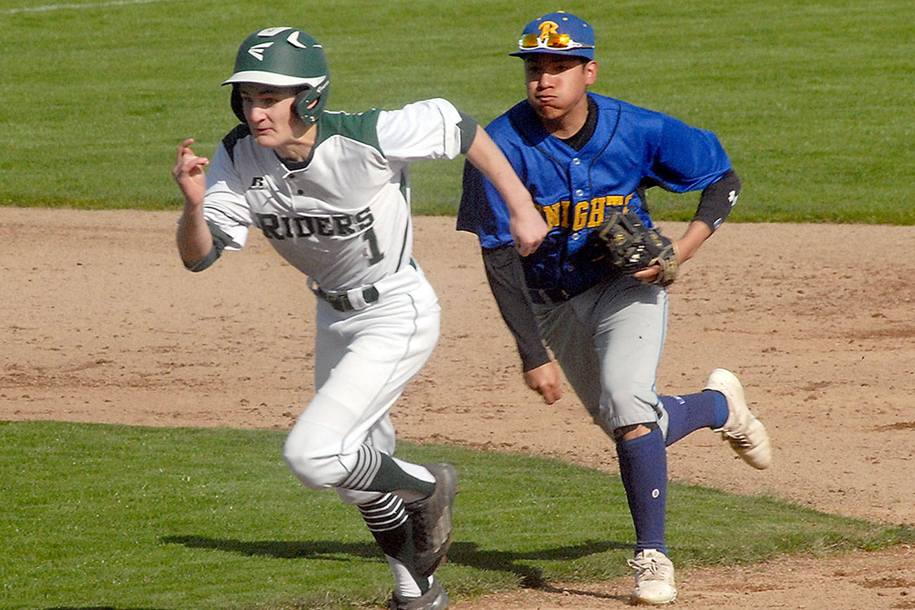BASEBALL: Woods throws 3-hitter, Roughriders’ offense clicking as Port Angeles blanks Bremerton