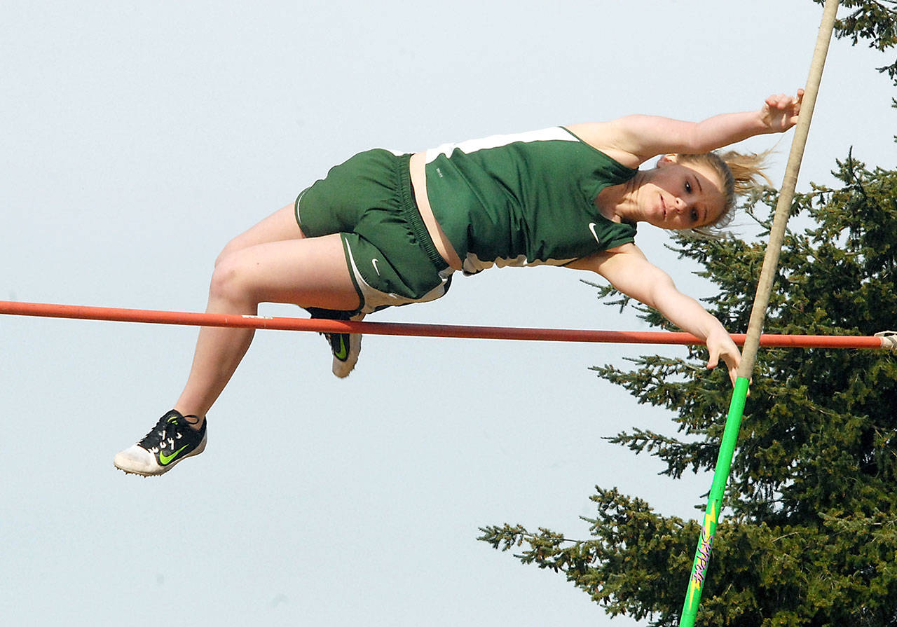 Keith Thorpe /Peninsula Daily News                                Port Angeles’ McKenzie Musalek clears the bar at 7 foot 6 inches to win the pole vault during Thursday’s track meet at Port Angeles High School.