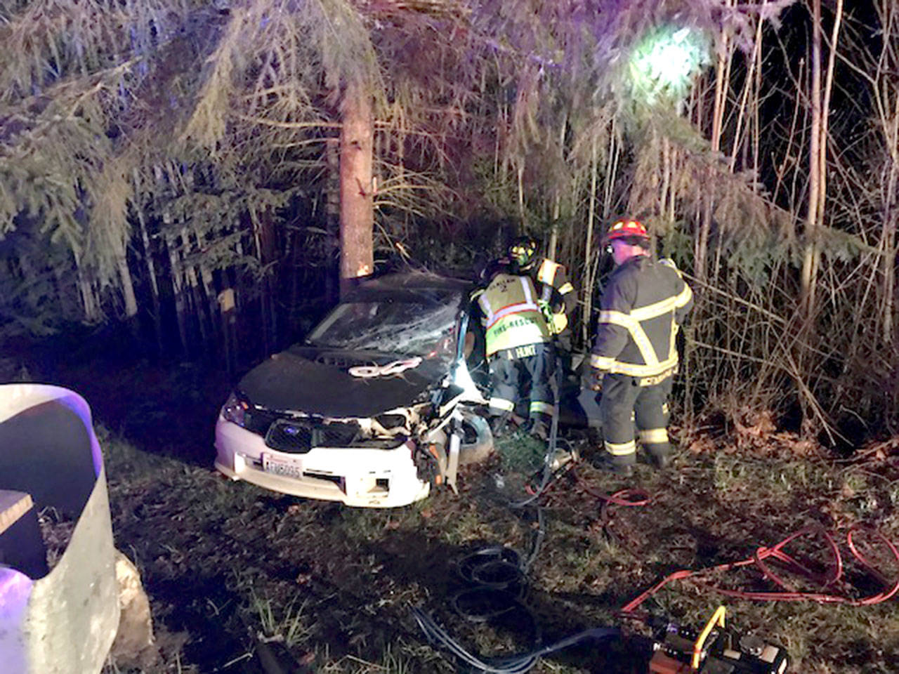 A Port Angeles man was hurt early Saturday morning when the Subaru Impreza he was driving hit a barrier on Deer Park Road and went down an embankment. (Clallam Fire District No. 2)