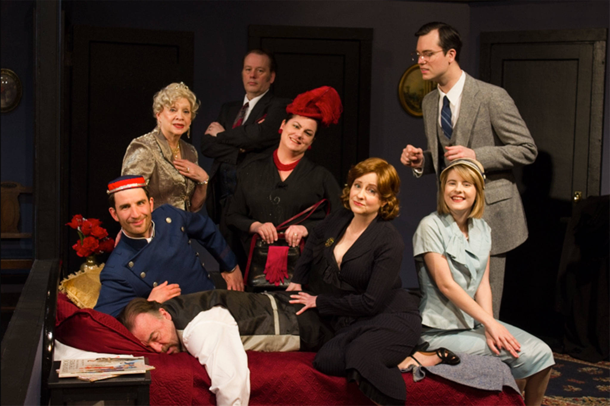 The cast of “Lend Me a Tenor” features from front left, Ron Graham (sleeping), Josh McLean, Angela Poynter, Alison Cobb; and back left, Kathy Balducci, Richard Stephens, Jennifer Saul and Randy Powell.