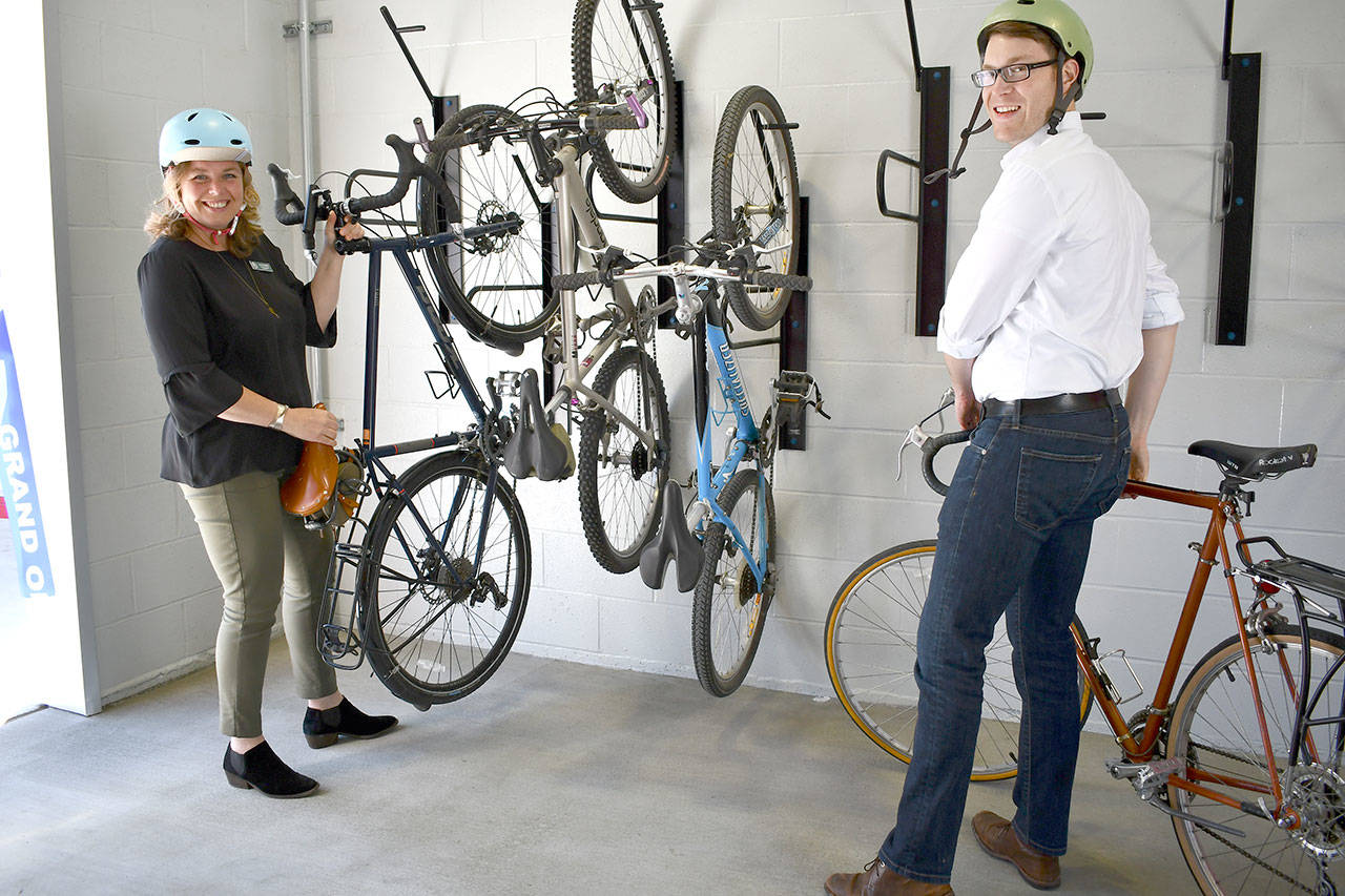 County Commissioner and Transit Board member Kate Dean and Port Townsend deputy mayor and Transit Board chair David Faber were on hand to open the new bike barn at the Jefferson Transit Center at 63 Four Corners. (Jeannie McMacken/ Peninsula Daily News)