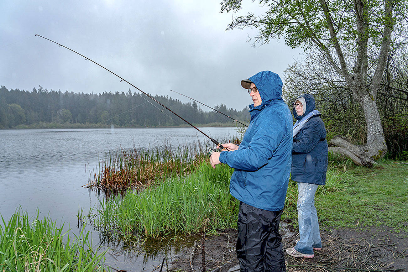OUTDOORS: Anglers fish through rainy opening day