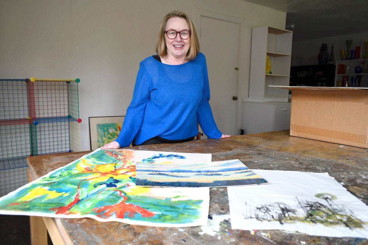 Northwind Arts Center Board President Thya Merz and a team of volunteers have been working to gather the art, furnishings and personal items of the centers co-founder, the late Jeanette Best, for an estate sale to be held Friday and Saturday from 9:30 a.m. to 5 p.m. at Bests waterfront home on Mats Mats Bay. (Jeannie McMacken/Peninsula Daily News)