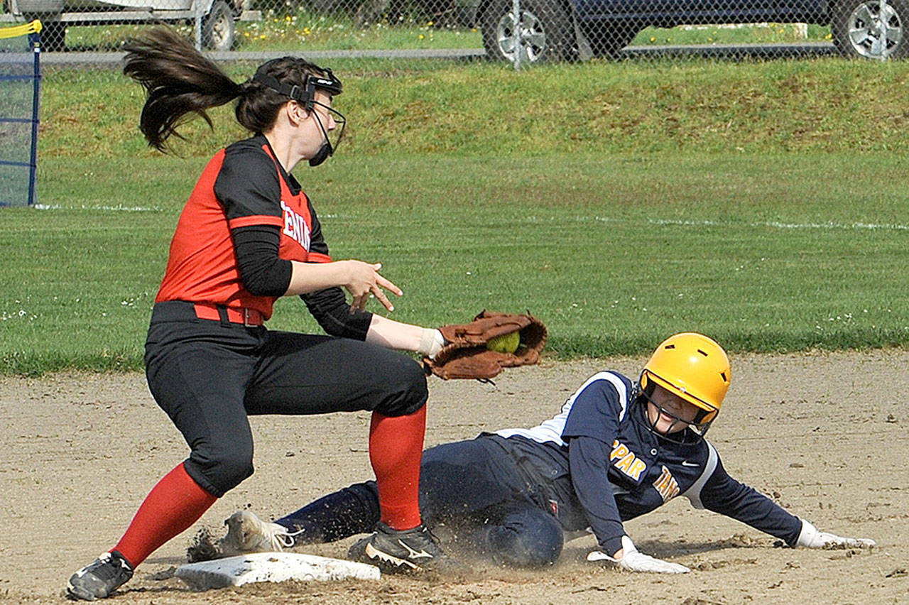 Forks’ Myah Rondeau safely steals second base Tuesday as Tenino’s Cassandra Cross takes the throw. Forks won the game 9-0 and qualified for the Class 1A Southwest District Softball Tournament. (Lonnie Archibald/for Peninsula Daily News)