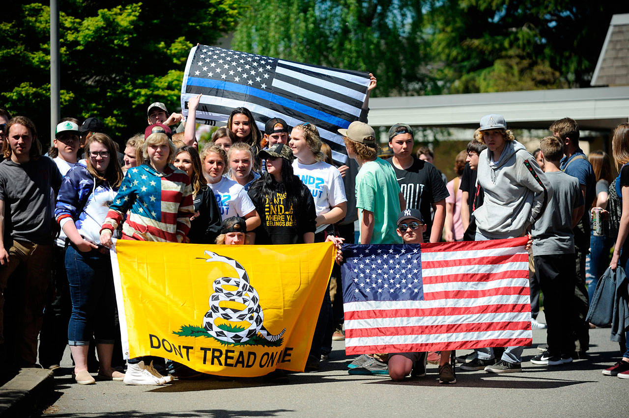 Sequim High school students gathered at the flagpole on campus for 16 minutes to participate in a national walkout Stand for the Second supporting the Second Amendment and the right to bear arms. (Erin Hawkins/Olympic Peninsula News Group)