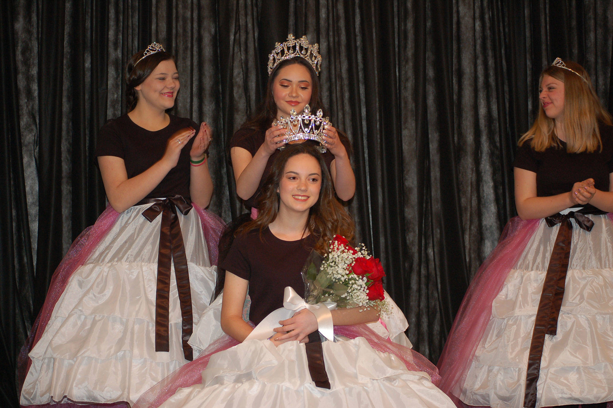 Princess Liliana Williams (foreground) was crowned at the Crazy Daze breakfast by Queen Erin Gordon, center, and joins Princesses Gabi Simonson, left, and Gracelyn Hurdlow on the 2018 Irrigation Festival Royalty Court. Erin Hawkins/Olympic Peninsula News Group