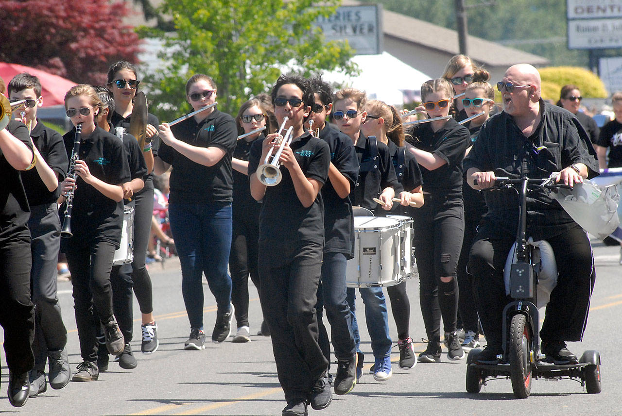 Members of the Sequim Middle School marching band perform in Saturday’s Irrigation Festival Grand Parade. (Keith Thorpe/Peninsula Daily News)                                Members of the Sequim Middle School marching band perform in Saturday’s Irrigation Festival Grand Parade. (Keith Thorpe/Peninsula Daily News)