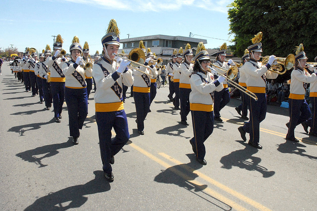 The Sequim High School Marching Band performs during the Irrigation Festival Grand Parade on Saturday in Sequim. (Keith Thorpe/Peninsula Daily News)