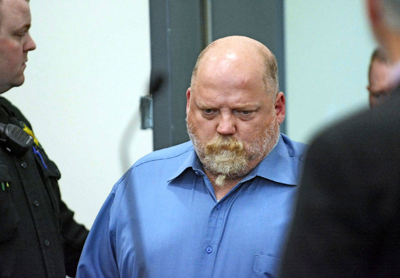 William Earl Talbott II enters the courtroom at the Skagit County Community Justice Center before entering a plea of not guilty for the 1987 murder of Tanya Van Cuylenborg on Friday in Mount Vernon. (Charles Biles/Skagit Valley Herald via AP)