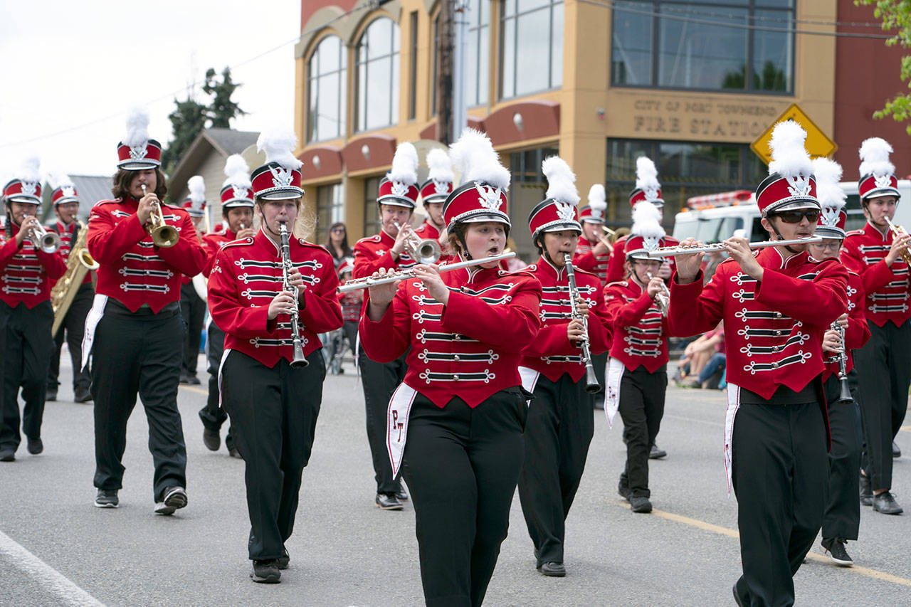 The Port Townsend High School marching band leads the 2018 Rhody Parade along Lawrence Street in Uptown Port Townsend on Saturday. (Steve Mullensky/for Peninsula Daily News)