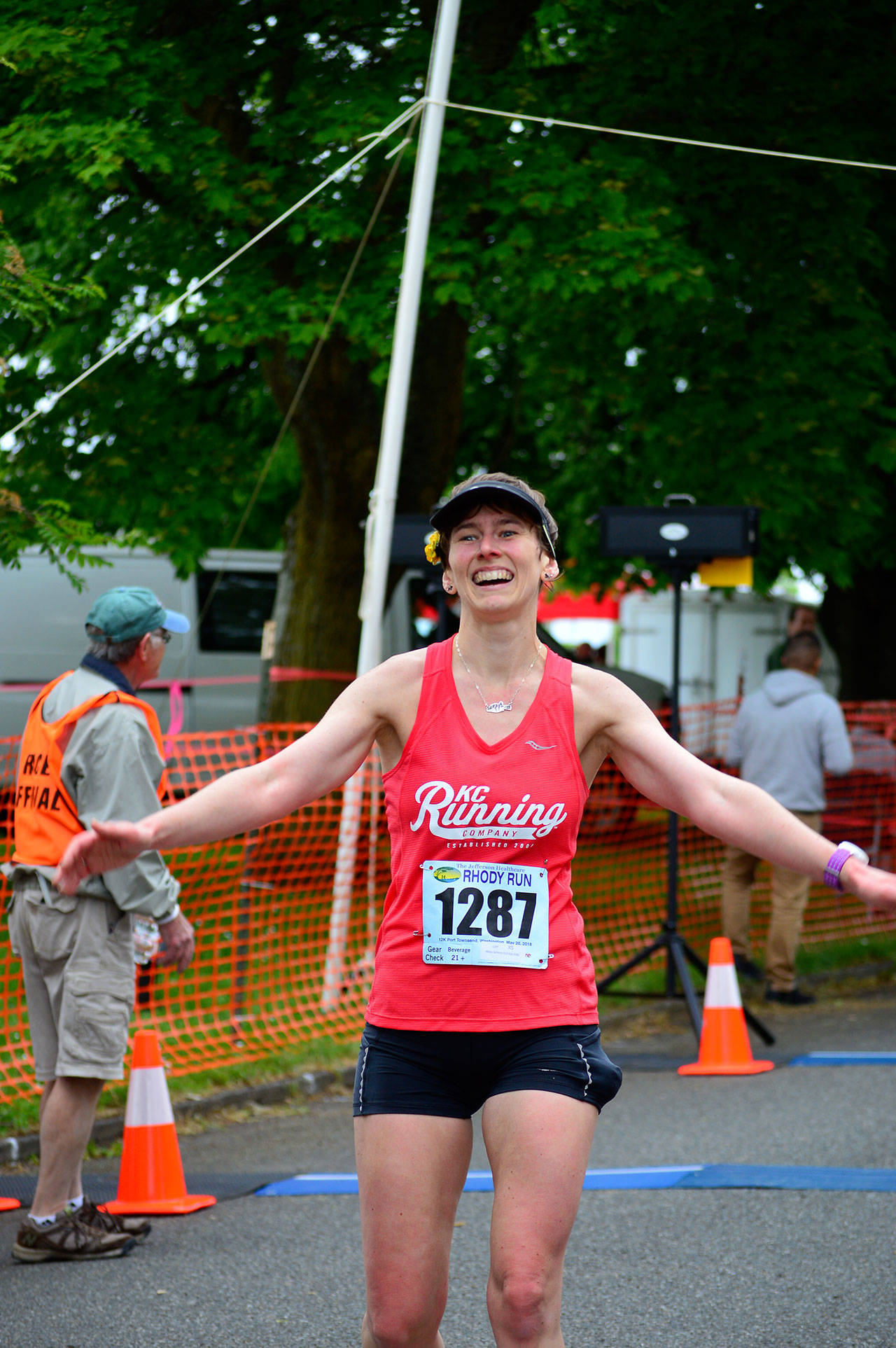 In her first Rhody Run, Amy Schmitz of Bainbridge Island wins the women’s division Sunday at Fort Worden State Park. (Diane Urbani de la Paz/for Peninsula Daily News)