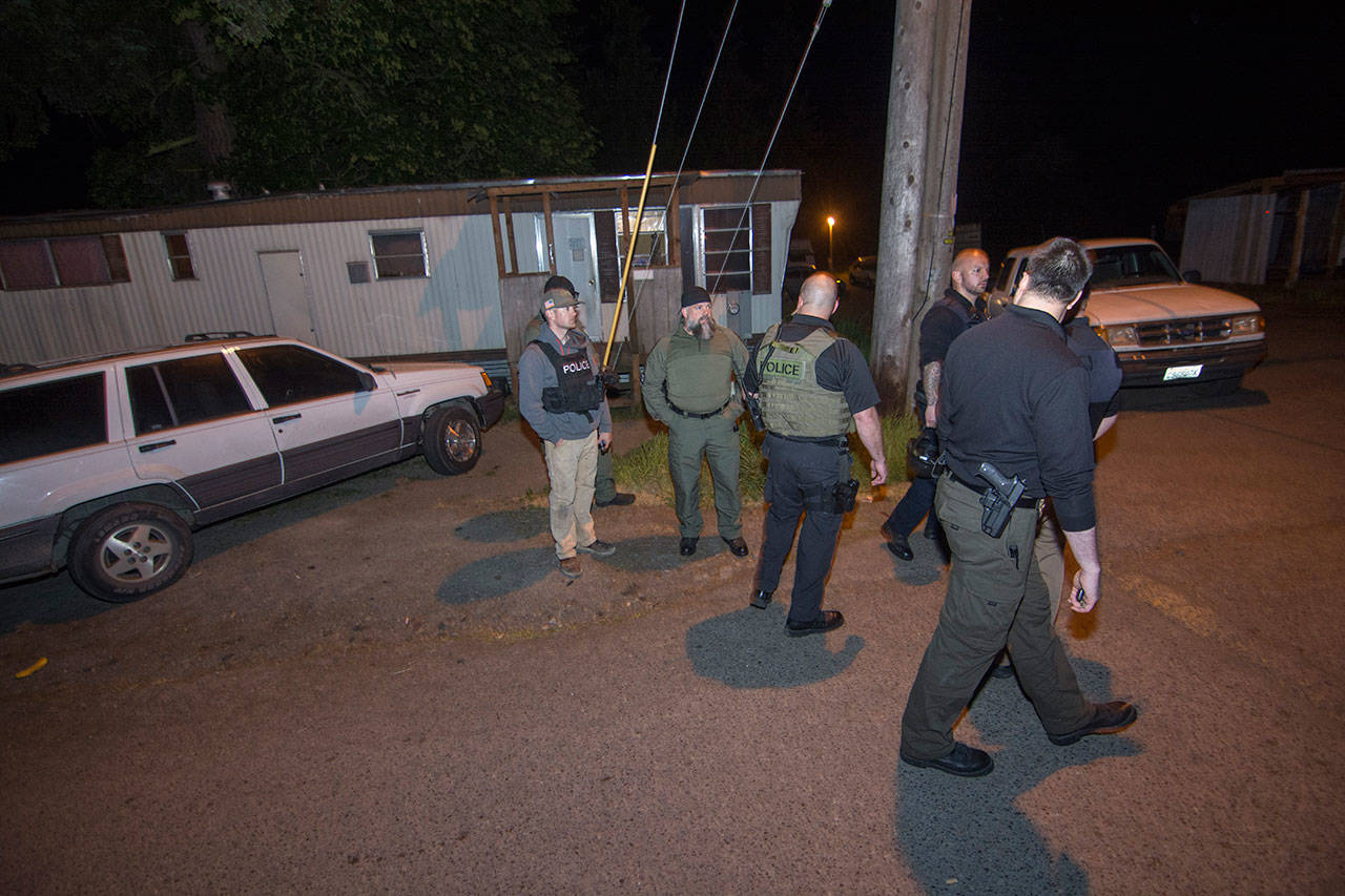 Local and federal law enforcement served search warrants and arrested multiple people at the Welcome Inn RV Park, 1215 U.S. Highway 101, in Port Angeles late Wednesday night. (Jesse Major/Peninsula Daily News)