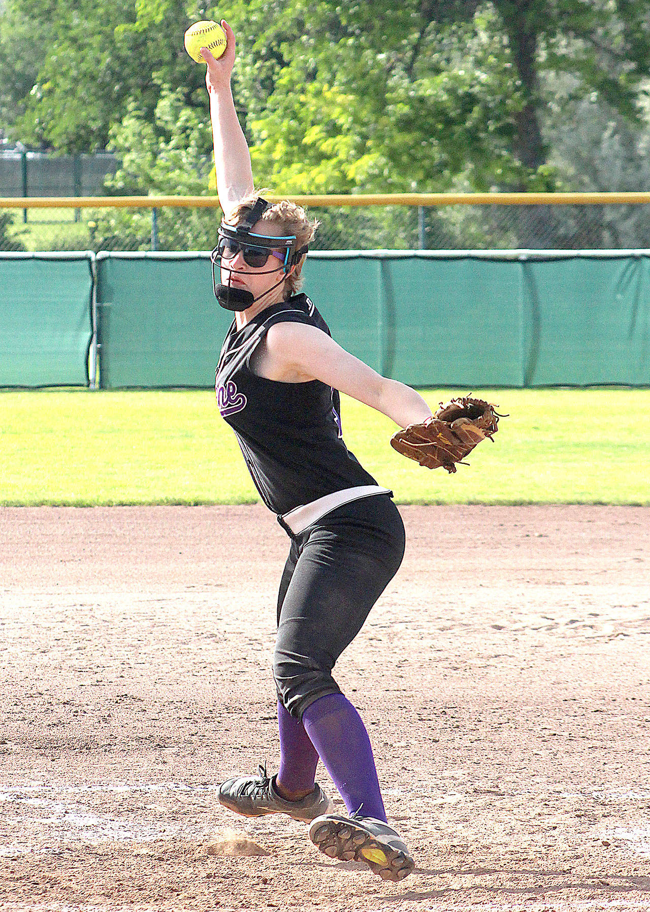 Quilcene’s Abby Weller winds up to pitch in the 1B State Championship game in Yakima against Almira/Coulee-Hartline on Saturday. (Roger Harnack/Daily Sun News)