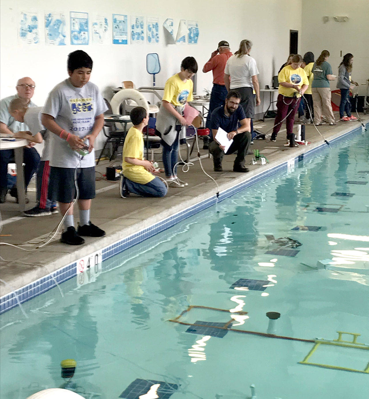 Students operate their underwater robots during the May 19 MATE ROV competition. (Olympic Coast National Marine Sanctuary)