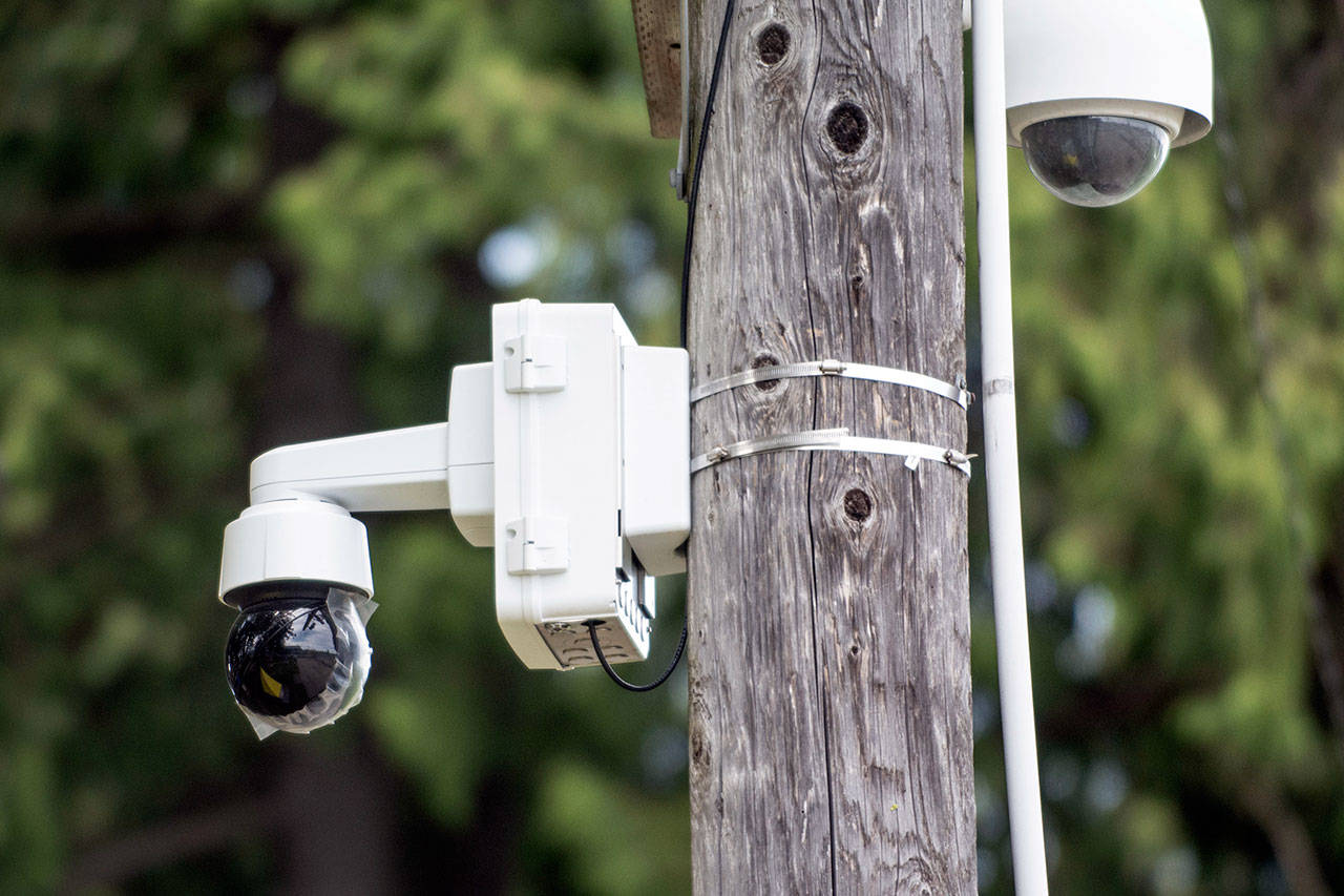 Newly installed cameras watch over Erickson Park in Port Angeles. (Jesse Major/Peninsula Daily News)