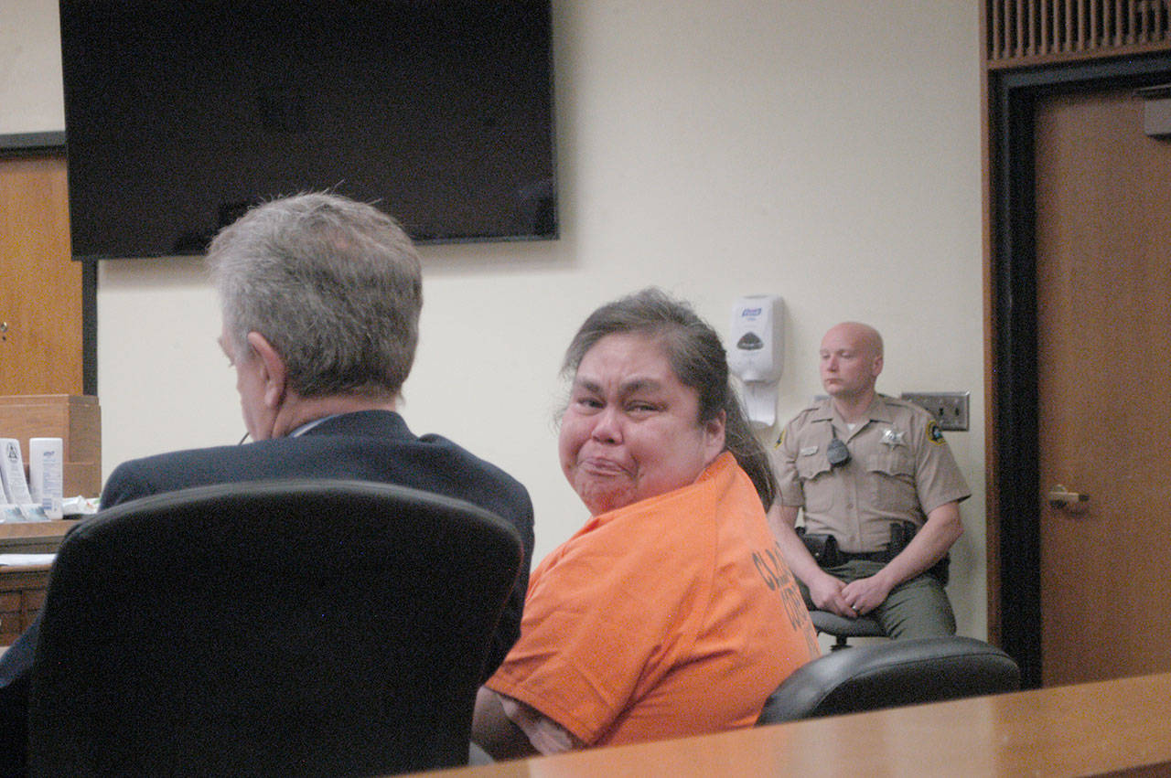 Ramona Ward sobbed in court Monday during her sentencing for homicide, at times turning in her seat at the defense table to face members of the public there for the proceedings. (Paul Gottlieb/Peninsula Daily News)