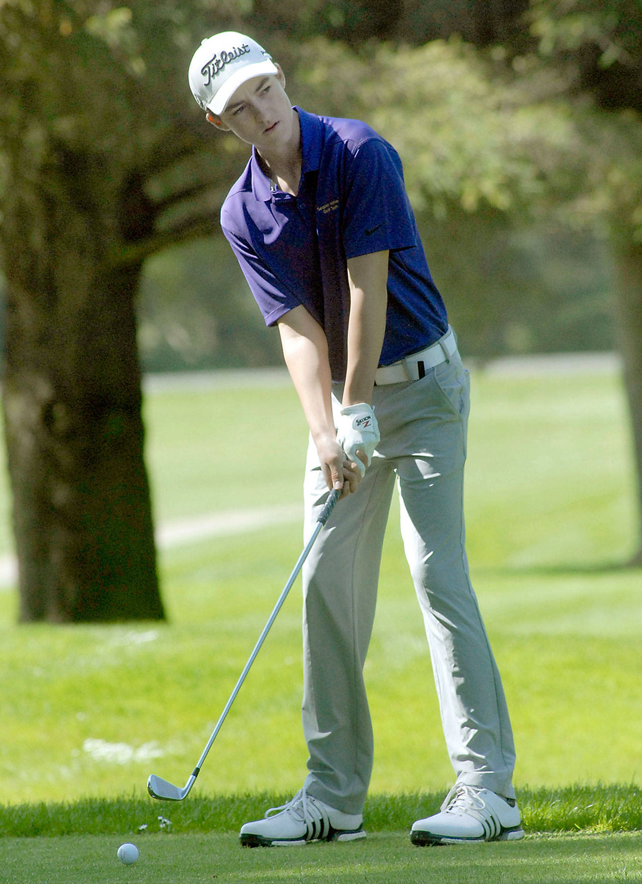 Sequim’s Paul Jacobsen looks down the fairway during the Olympic League Tournament in May at The Cedars at Dungeness.                                Keith Thorpe/Peninsula Daily News