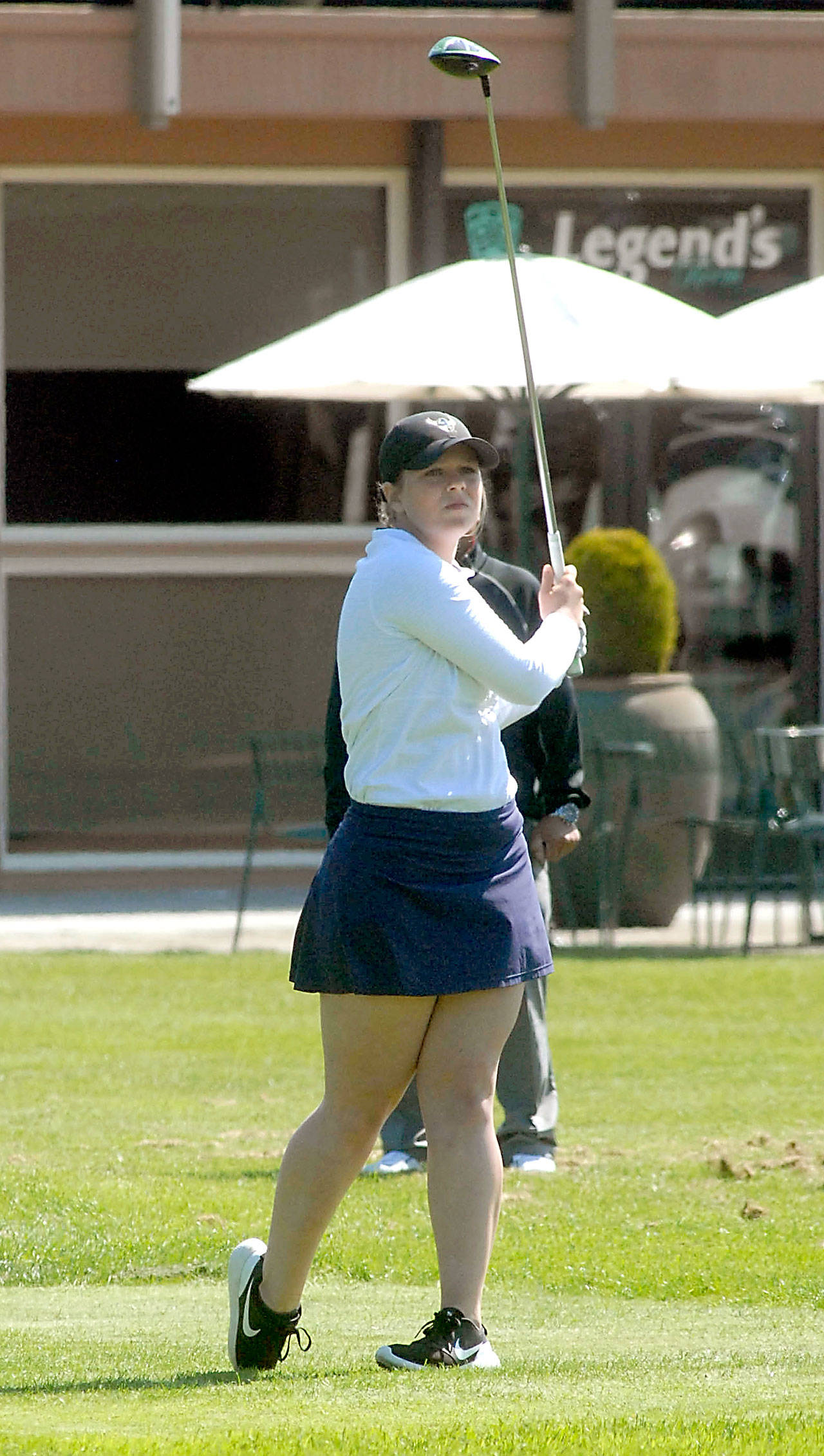 Keith Thorpe/Peninsula Daily News Sarah Shea of Sequim tees off on the first hole during the Olympic League Tournament in May at The Cedars at Dungeness.