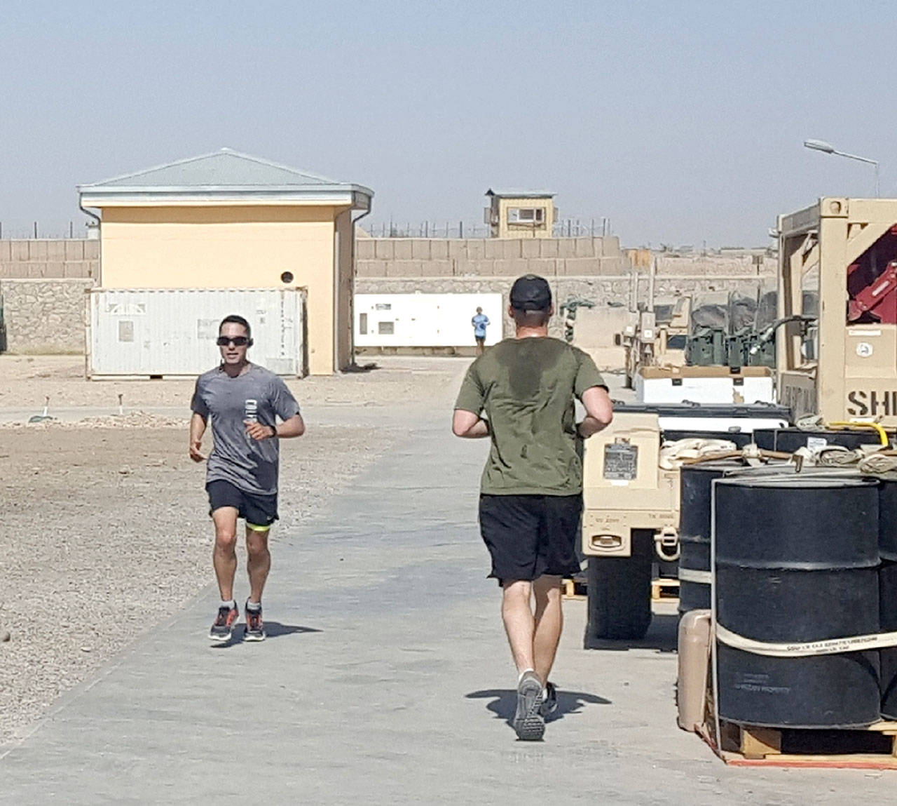 Participants in the Run for Joe “shadow run” in Afghanistan run to raise awareness for the Captain Joseph House in Port Angeles.