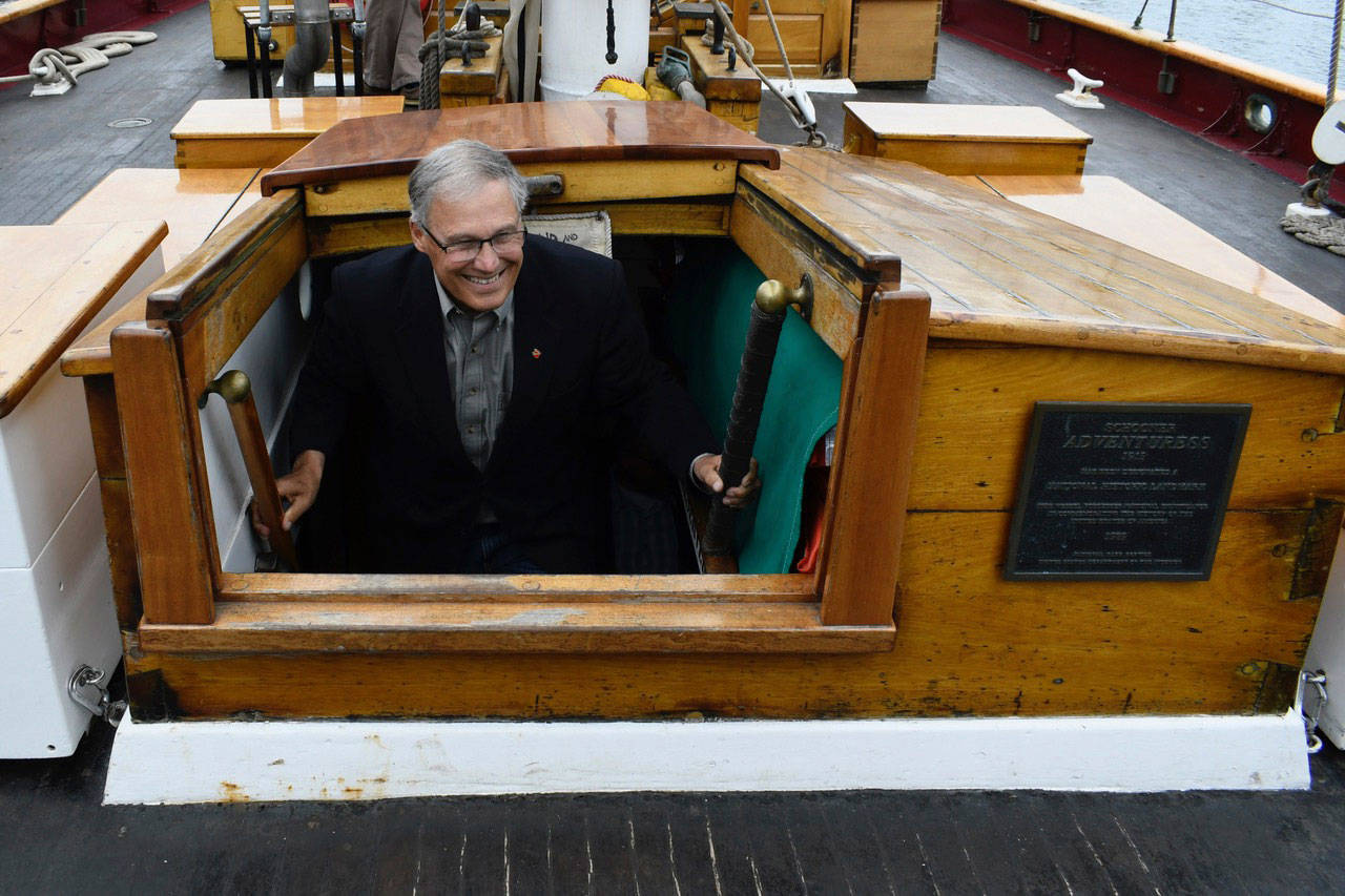 Gov. Jay Inslee tours the Adventuress, a National Historic Landmark sailing ship and Puget Sound’s official “Environmental Tall Ship,” during a visit to Port Townsend on Thursday. Programs on the vessel lead to school credit and careers in the maritime industry. Built in 1913, the schooner has seen 50,000 students over the past 30 years. (Jeannie McMacken/Peninsula Daily News)