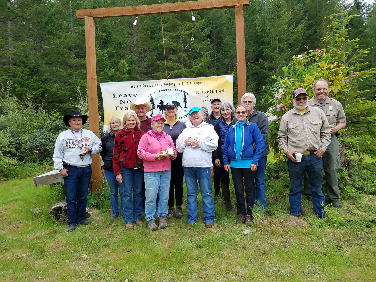 Back Country Horsemens Peninsula chapter members took part in their annual Miller Peninsula Rhody Ride, timed when all the Rhododendrons are in full bloom. (Linda Morin)