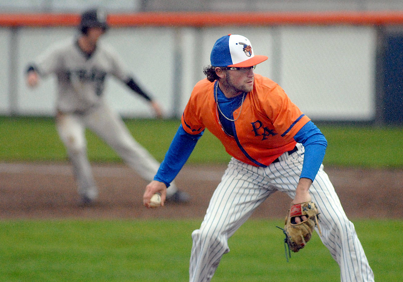 Keith Thorpe/Peninsula Daily News Lefties pitcher Triston Busse prepares to make the delivery during a game against Bellingham earlier this month at Civic Field.