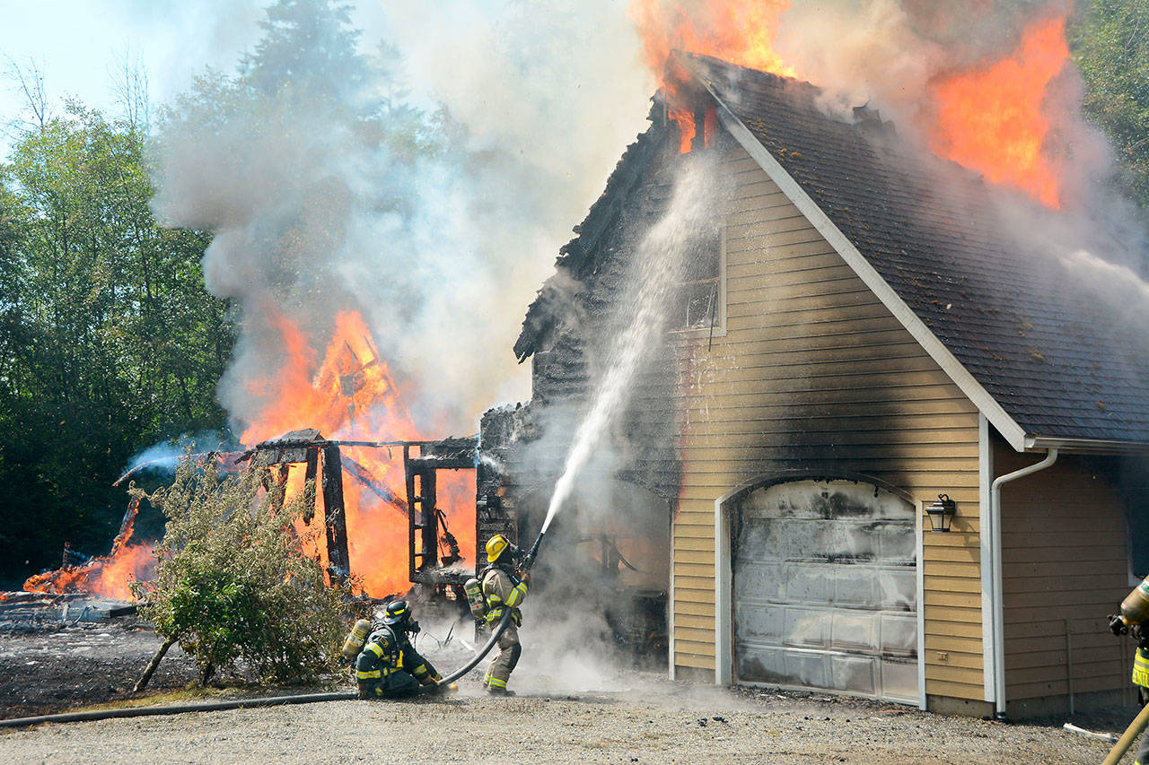 Structure fire photos from 131 Pristine Lane off of Lake Farm Road on Tuesday afternoon. (Jay Cline/Clallam Fire District No. 2)