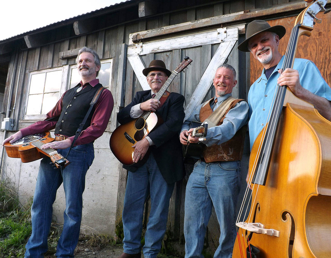 FarmStrong is part of the Red, White and Bluegrass celebration of local food and music at Finnriver Farm & Cidery this weekend. From left are Rick Meade, Jim Faddis, Cort Armstrong and John Pyles. (Kia Armstrong)