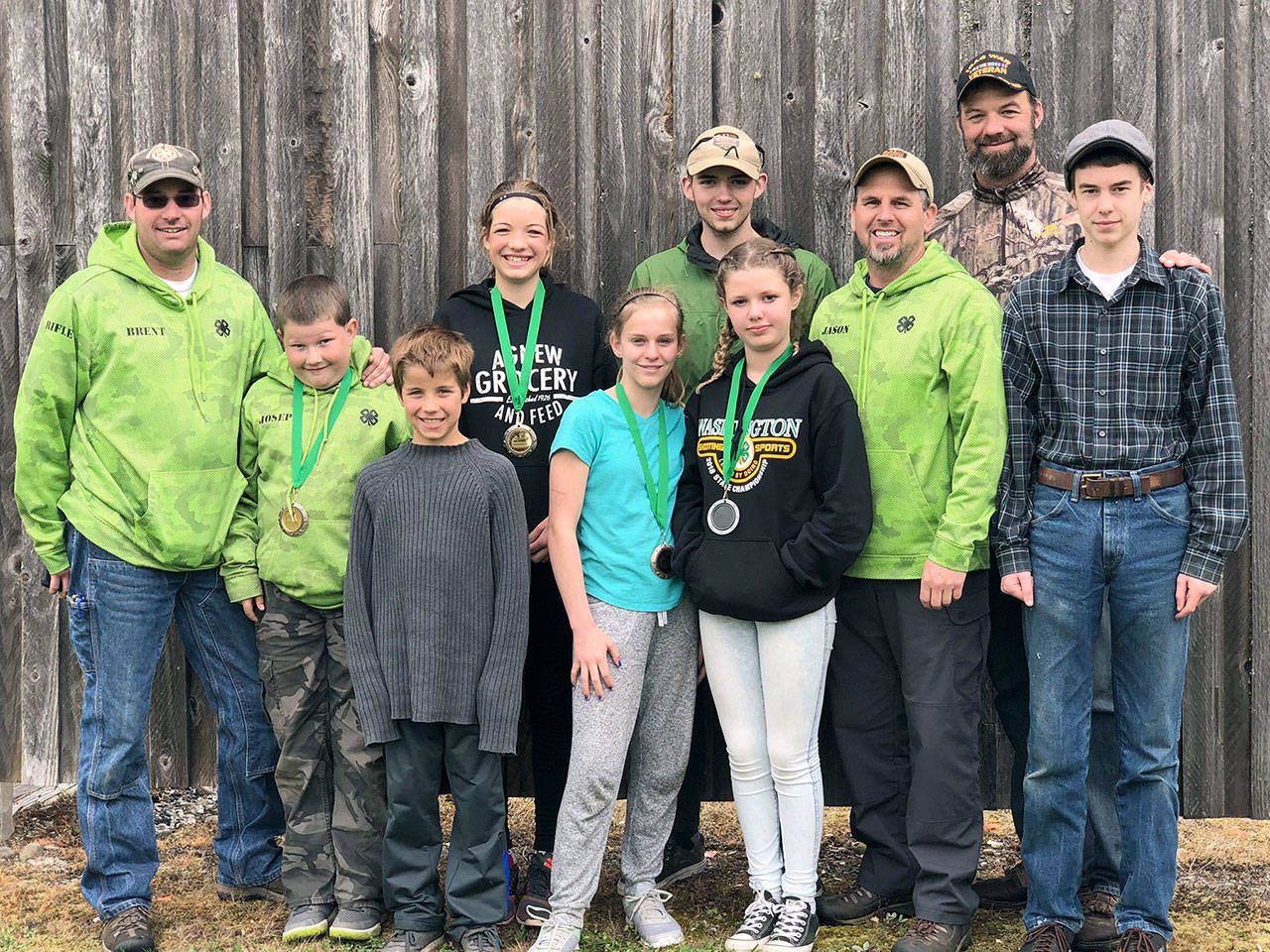 From left, front row, Jay Geniesse, Miriam Graves, Jacklyn Minnoch, Coach Jason Minnoch, Phillip Powers; and from left, back row, Coach Brent Maggard, Joseph Maggard, Bailey Geniesse, Aaron Andrews, and Coach Seth Geniesse.