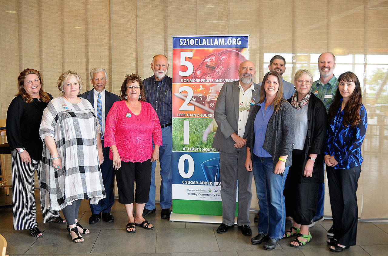 Taking part in the Olympic Peninsula Health Care Coalition’s 2018 Healthy Leaders 5210 Challenge are, from left, Rebekah Miller, Andra Smith, Eric Lewis, Cindy Kelly, Thom Hightower, Jim Stoffer, Nicole Brewer, Mark Ozias, Patty Lebowitz, Tom Sanford and Mary Budke. Not pictured is Jessica Hernandez. (Michael Dashiell/Olympic Peninsula News Group)