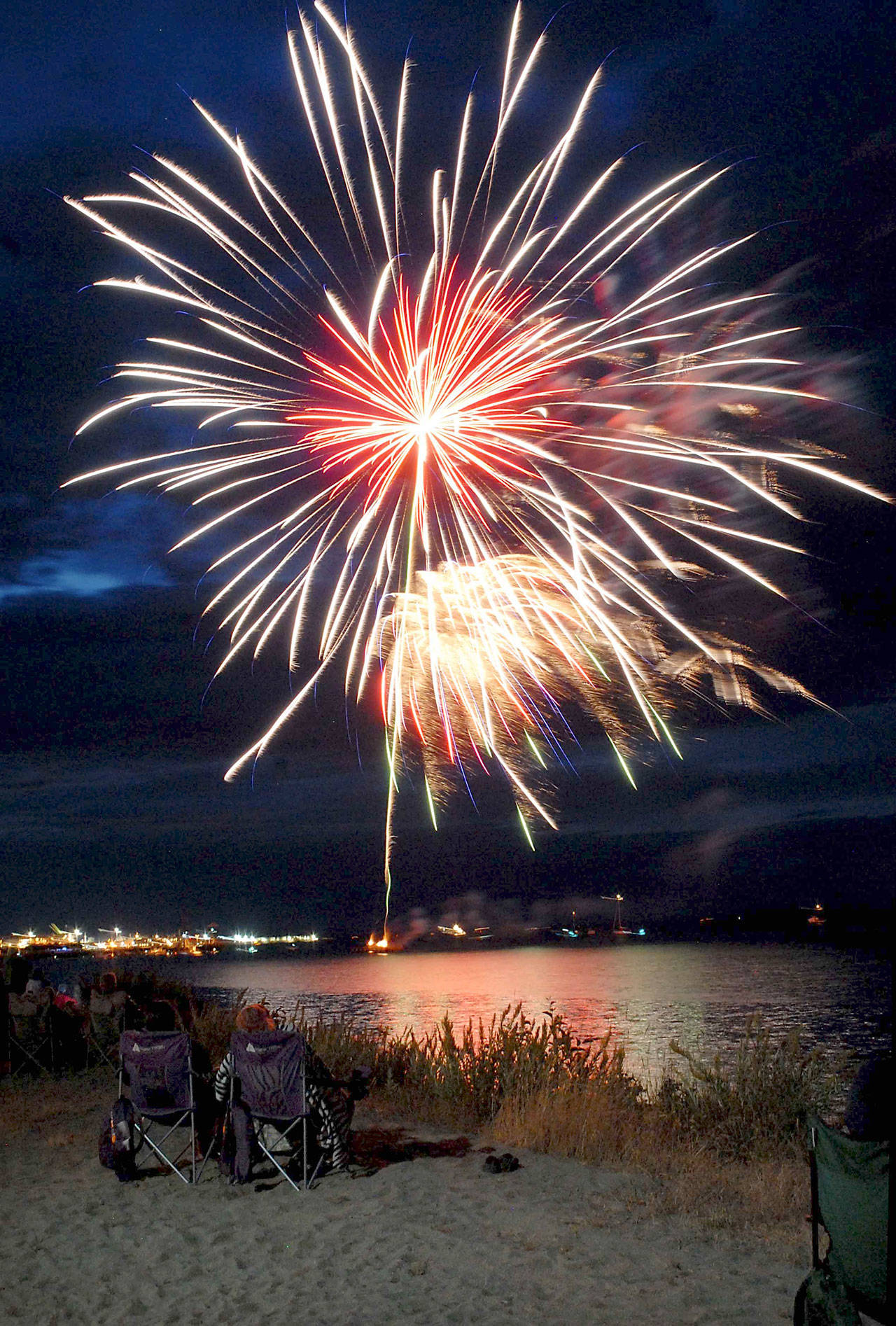 Fireworks light up the night over Port Angeles Harbor on Independence Day. (Keith Thorpe/Peninsula Daily News)